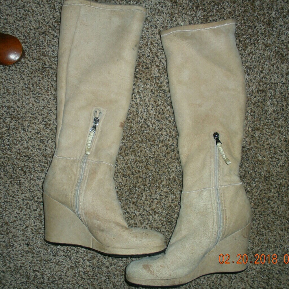 Prada boots, never worn.